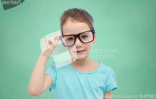 Image of happy little girl in eyeglasses