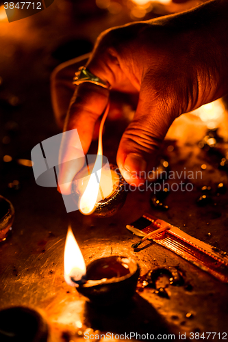 Image of Burning candles in the Indian temple.