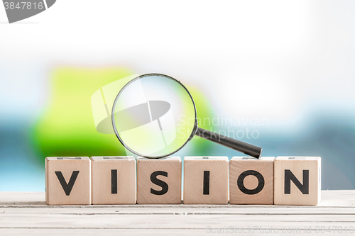 Image of Vision word and a magnifying glass