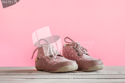 Image of Baby shoes in pink color