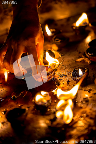 Image of Burning candles in the Indian temple.