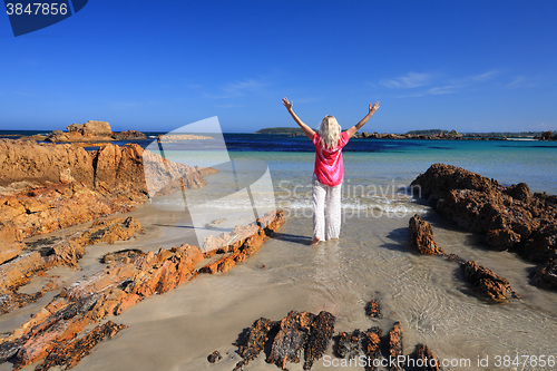 Image of Love Vacation Love Summer at Beach, female arms raised happiness