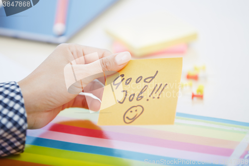 Image of Good job text on adhesive note