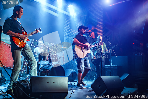 Image of Band performs on stage