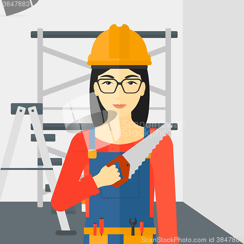 Image of Smiling worker with saw.