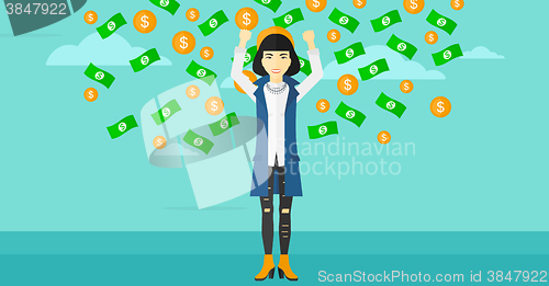 Image of Happy woman with  flying money. 
