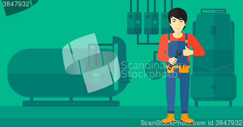 Image of Cheerful repairer with spanner.