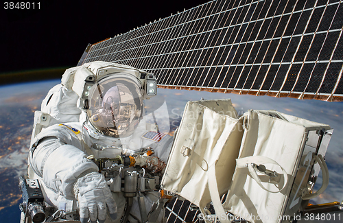 Image of International Space Station and astronaut.