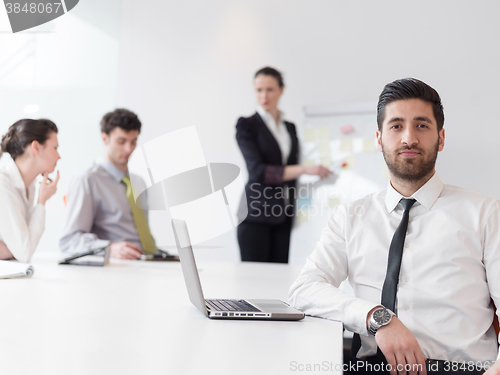Image of portrait of young modern arab business man  at office