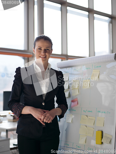 Image of portrait of young business woman at modern office