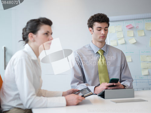 Image of group of young business people  on meeting at modern startup off