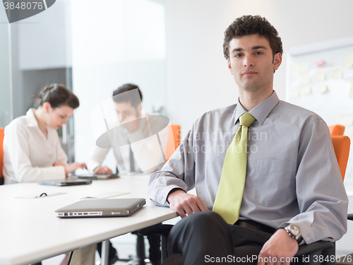 Image of group of young business people  on meeting at modern startup off