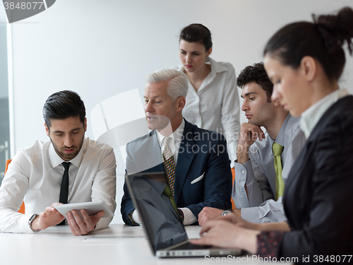 Image of business people group on meeting at modern startup office