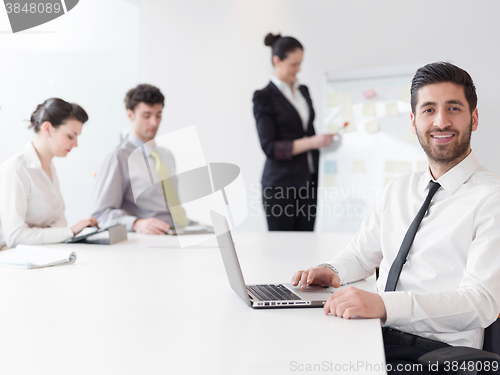 Image of portrait of young modern arab business man  at office