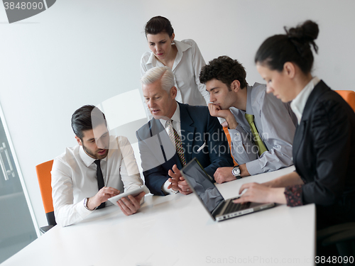 Image of business people group on meeting at modern startup office