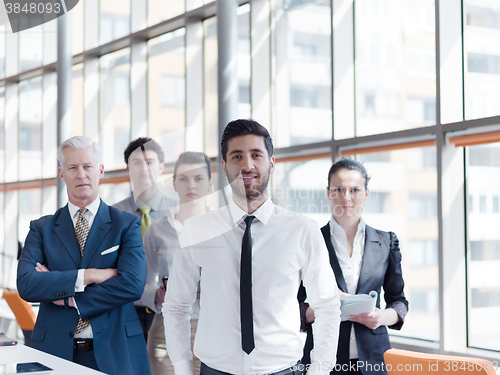 Image of portrait of business people group at modern office