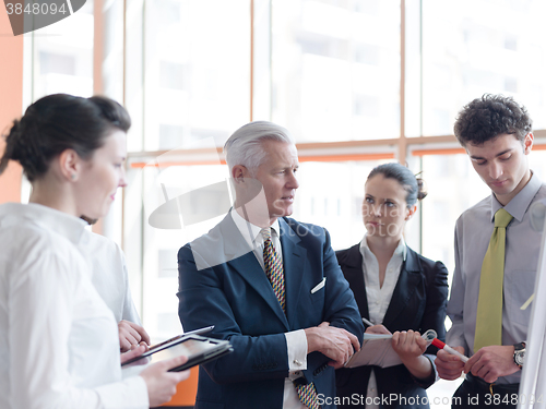 Image of business leader making presentation and brainstorming