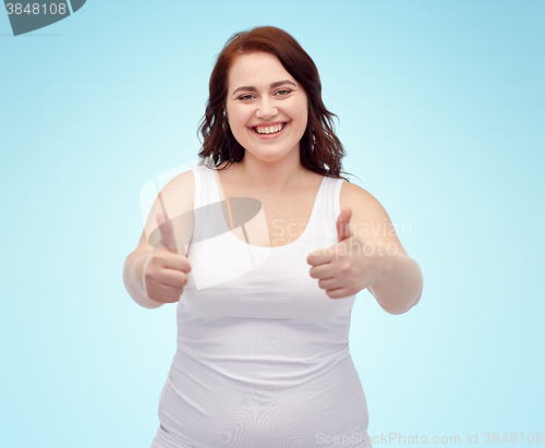 Image of plus size woman in underwear showing thumbs up