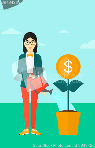Image of Woman watering money flower.