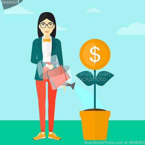 Image of Woman watering money flower.