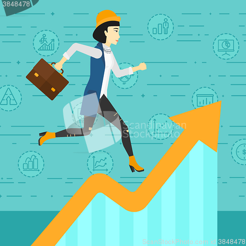 Image of Woman running on growth graph. 