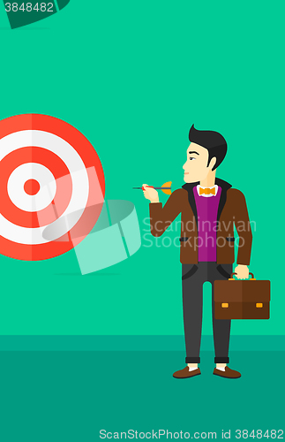 Image of Businessman with target board.