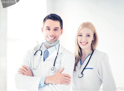 Image of two young attractive doctors