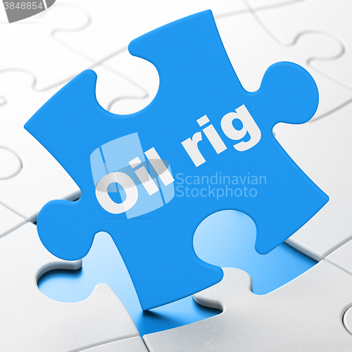 Image of Manufacuring concept: Oil Rig on puzzle background