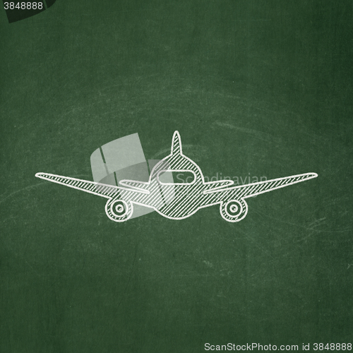 Image of Tourism concept: Aircraft on chalkboard background