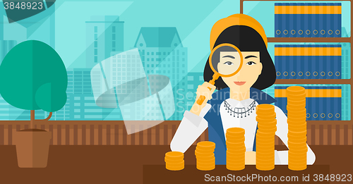 Image of Woman with magnifier and golden coins. 