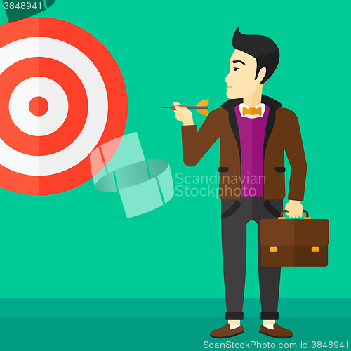 Image of Businessman with target board.