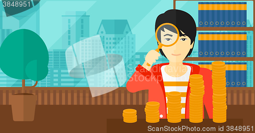 Image of Man with magnifier and golden coins. 