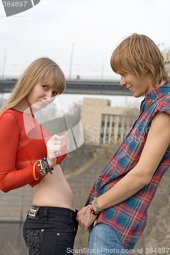 Image of Young couple - the guy and the girl outdoor 6