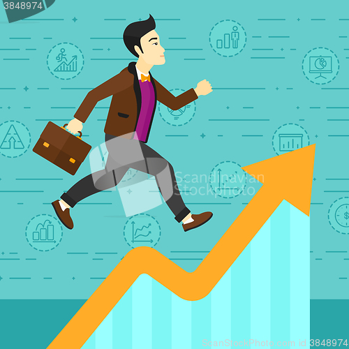 Image of Man running on growth graph. 