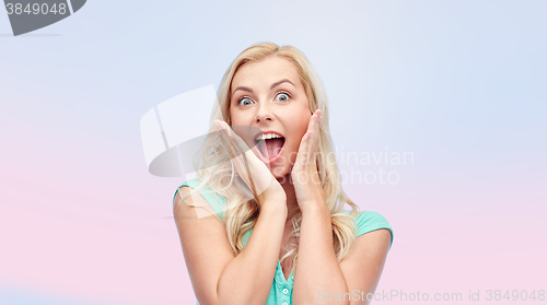 Image of surprised smiling young woman or teenage girl