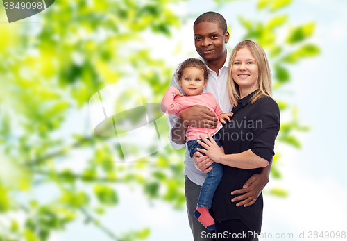 Image of happy multiracial family with little child