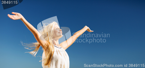 Image of beautiful woman enjoying summer outdoors