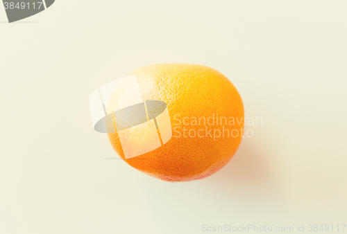 Image of ripe grapefruit over white