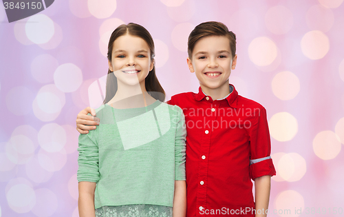 Image of happy boy and girl hugging