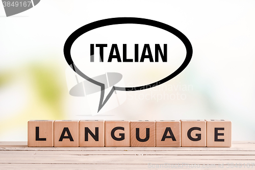 Image of Italian language lesson sign on a table