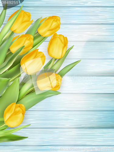 Image of Yellow tulips flowers on wooden planks. EPS 10