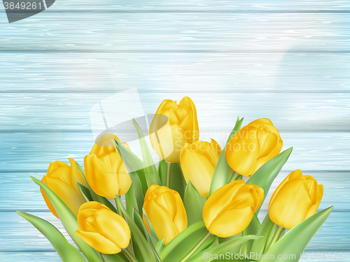 Image of Yellow tulips flowers on wooden planks. EPS 10
