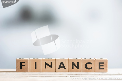 Image of Finance sign on an office desk