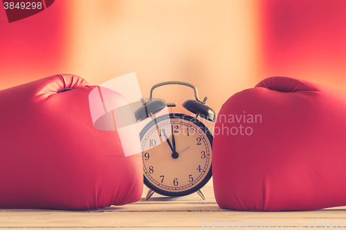 Image of Boxing gloves punching time