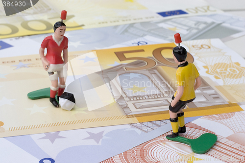 Image of Figures of football players on banknotes