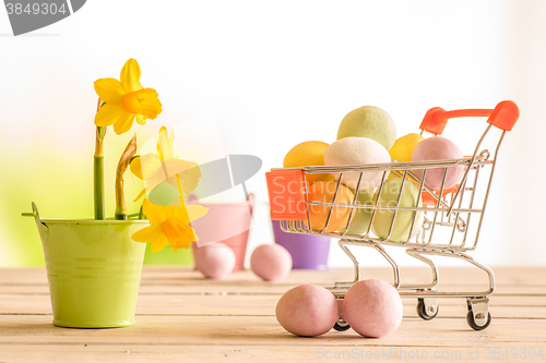 Image of Shopping cart with colorful easter eggs