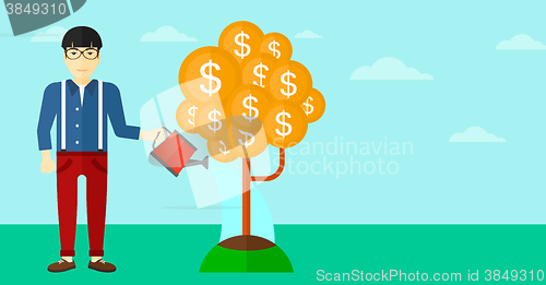 Image of Man watering money tree.