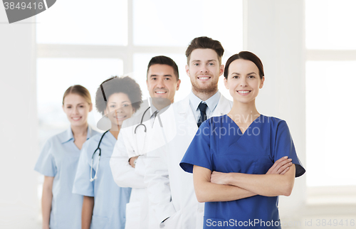 Image of group of happy doctors at hospital