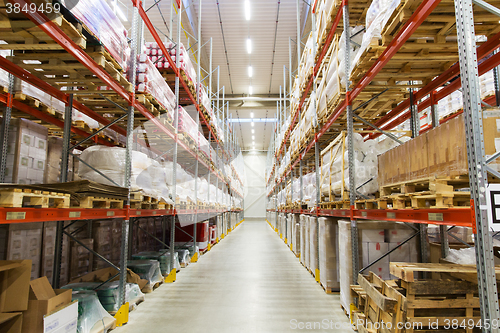 Image of cargo boxes storing at warehouse shelves