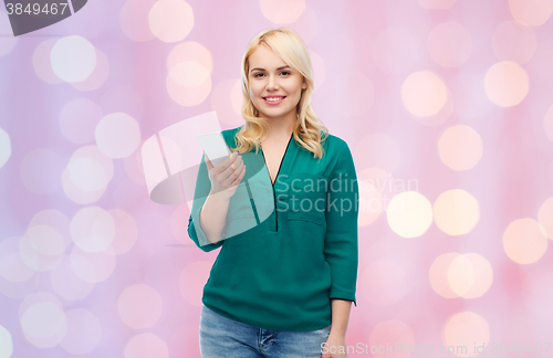 Image of happy woman with smartphone